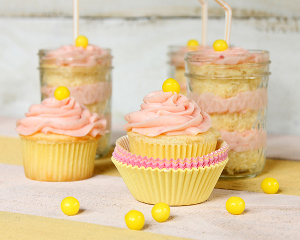 Strawberry Lemonade Cupcakes - moist lemon cupcakes paired with fresh strawberry buttercream for the perfect combination of sour and sweet | by Lauren Kapeluck for TheCakeBlog.com