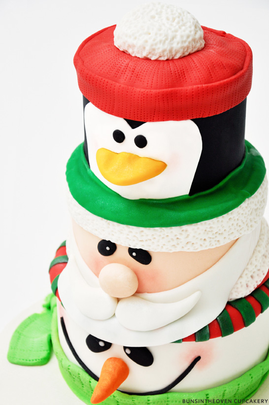 Santa, Penguin, Snowman Cake by BunsInTheOven Cupcakery