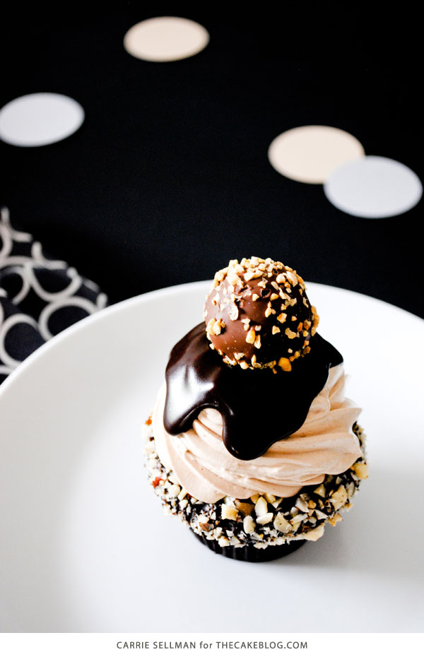 Chocolate Truffle Cupcake | dark chocolate ganche, milk chocolate buttercream, more ganache and a hazelnut truffle | by Carrie Sellman for TheCakeBlog.com