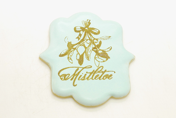 How to stencil-paint a cookie | Mistletoe Cookie Tutorial | by Robin Martin for TheCakeBlog.com