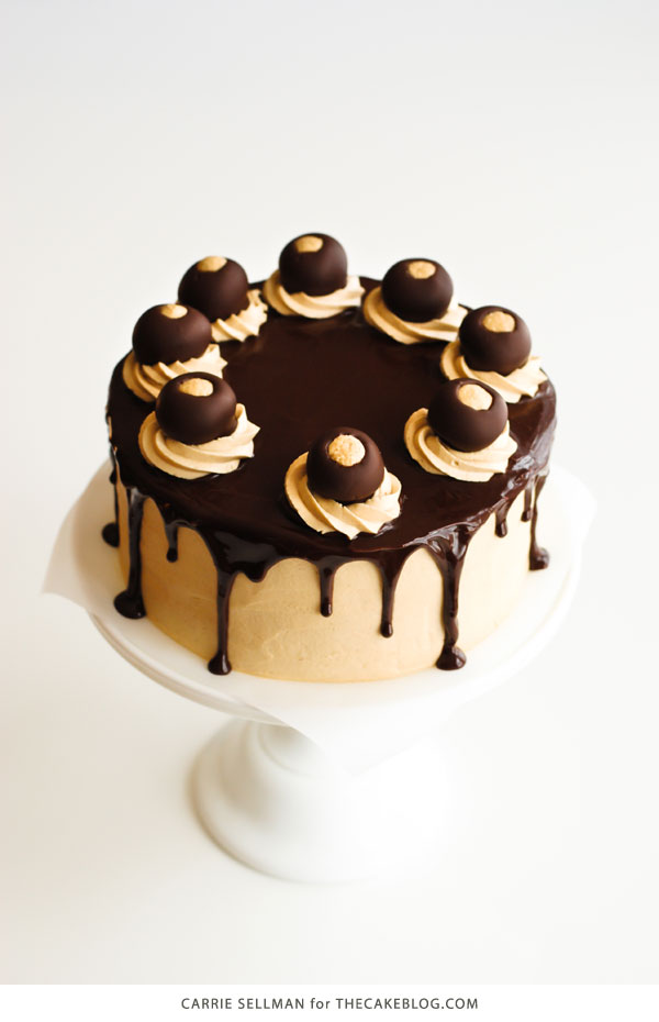 Chocolate Peanut Butter Cake - moist chocolate cake paired with peanut butter frosting and filling, topped with drippy chocolate ganache and homemade peanut butter balls, aka buckeyes | Carrie Sellman for TheCakeBlog.com
