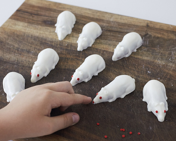 Creepy Mice Cakes! Learn how to make these spooky, red velvet filled, mice cakes -- a Halloween food sure to freak out your party guests | Cakegirls for TheCakeBlog.com