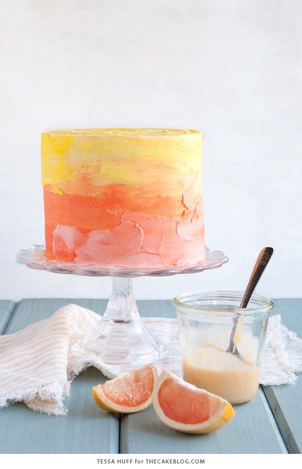 Pink Grapefruit Cake. A light olive oil cake filled with grapefruit curd and frosted with whipped vanilla buttercream - perfect for spring brunches, showers and birthdays | by Tessa Huff for TheCakeBlog.com