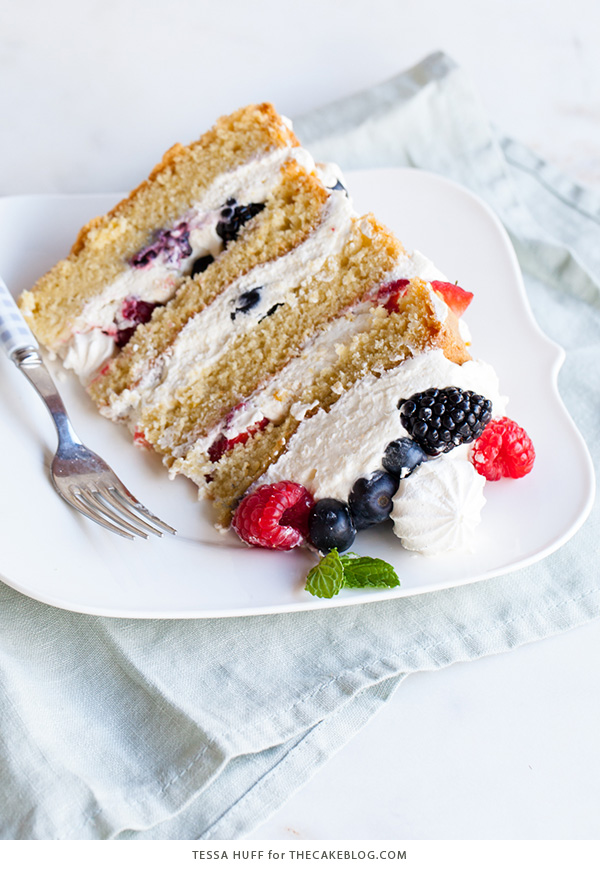  Mess Cake - Inspired by the classic dessert, this cake combines crisp meringues, sweetened cream, fresh berries - layered between an airy sponge cake. | By Tessa Huff for TheCakeBlog.com