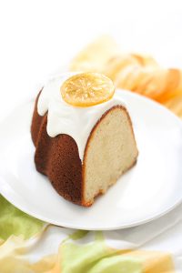 Candied Lemon Bundt Cake - lemon pound cake topped with lemon cream cheese frosting and candied lemon slices | By Carrie Sellman for TheCakeBlog.com