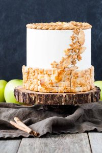 Apple Pie Cake! A layer cake recipe with hints of cinnamon and nutmeg, fresh apple pie filling, buttercream frosting and braided pie crust lattice | by Olivia Bogacki for TheCakeBlog.com