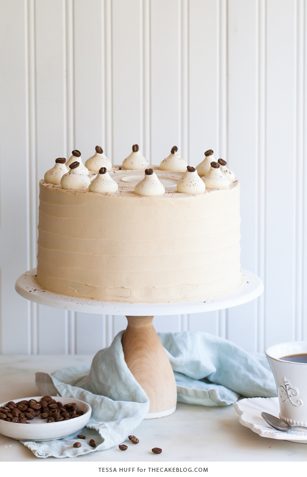Caramel Cappuccino Cake - espresso cake paired with caramel buttercream frosting, topped with whole coffee beans and a sprinkle of cocoa powder | by Tessa Huff for TheCakeBlog.com