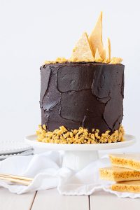 Dark Dark Chocolate Honeycomb Cake - a rich chocolate layer cake recipe with ultra dark, fudgy frosting and homemade honeycomb | by Olivia Bogacki for TheCakeBlog.com