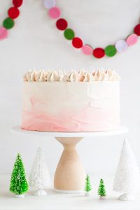 Peppermint Red Velvet Cake - bright red cake layered with white chocolate peppermint buttercream | by Tessa Huff for TheCakeBlog.com