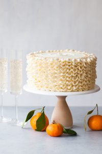 Champagne Mimosa Cake - tender, orange sponge cake smothered with silky champagne buttercream | by Tessa Huff for TheCakeBlog.com