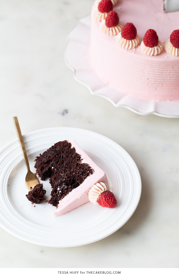 Chocolate Raspberry Cake - moist chocolate cake layered with raspberry jam, topped with raspberry cheesecake frosting and fresh red raspberries | by Tessa Huff for TheCakeBlog.com