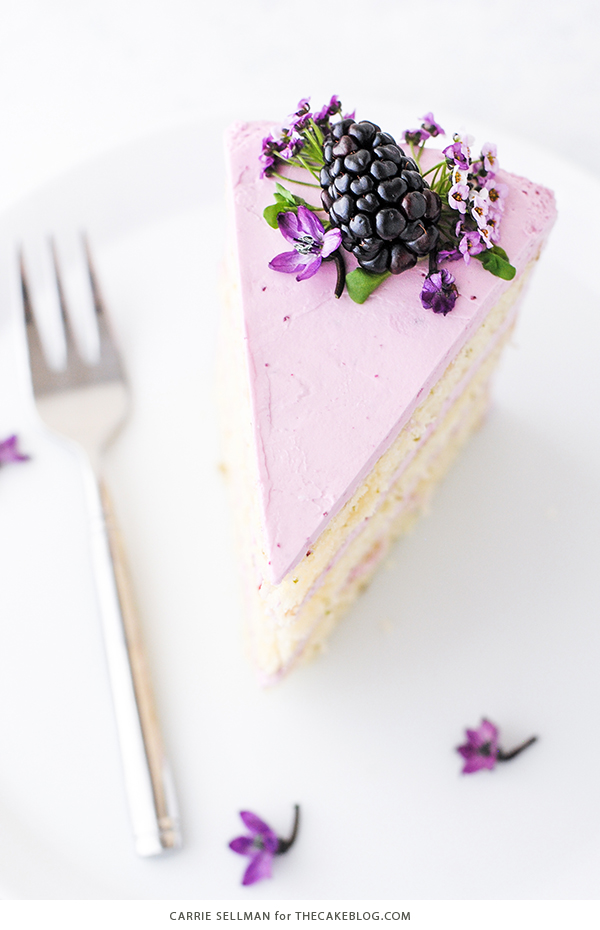 Blackberry Lime Cake - tender cake infused with lime zest, frosted with blackberry buttercream, topped with fresh blackberries and edible flowers | by Carrie Sellman for TheCakeBlog.com