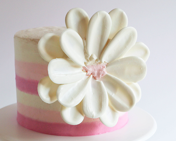 White Chocolate Flower Cake – how to make a side chocolate flower cake, using candy melts and everyday tools | by Erin Gardner for TheCakeBlog.com