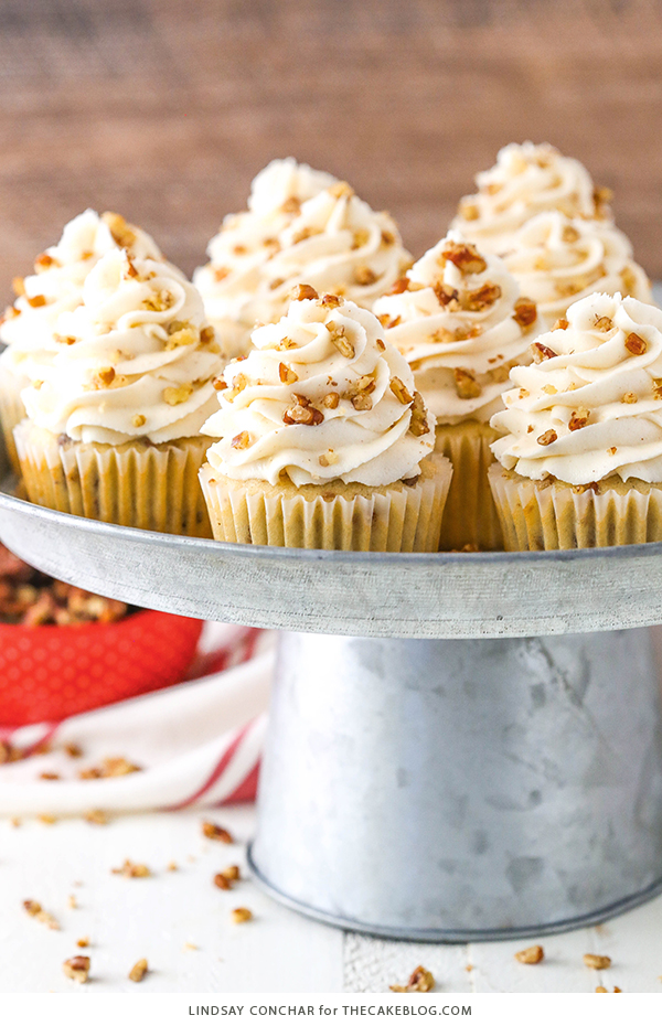 Butter Pecan Cupcakes - moist vanilla cupcakes studded with toasted butter pecans and topped with cinnamon buttercream frosting | by Lindsay Conchar for TheCakeBlog.com