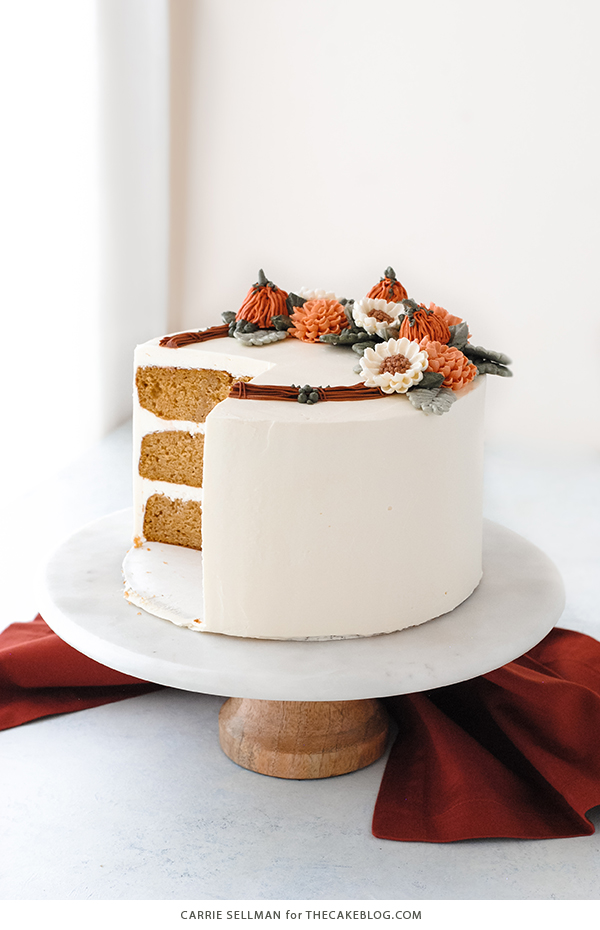 Pumpkin Spice Cake - moist pumpkin cake with cinnamon, ginger and nutmeg paired with pumpkin spice buttercream frosting | by Carrie Sellman for TheCakeBlog.com