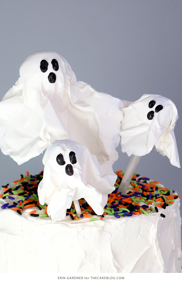 Chocolate Lollipop Ghosts - how to make edible lollipop ghosts for Halloween cakes and cupcakes using white chocolate and suckers | by Erin Gardner for TheCakeBlog.com