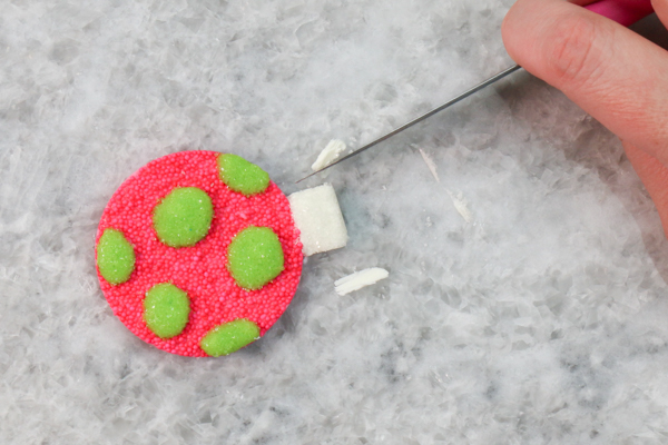 Sprinkle Ornament Cake – how to make sparkling ornaments for cakes and cupcakes using chocolate, cookie cutters and sprinkles | by Erin Gardner for TheCakeBlog.com