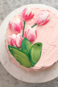 Chocolate Tulips - how to make gorgeous tulip cake decorations using melted chocolate and a plastic spoon | by Erin Gardner for TheCakeBlog.com
