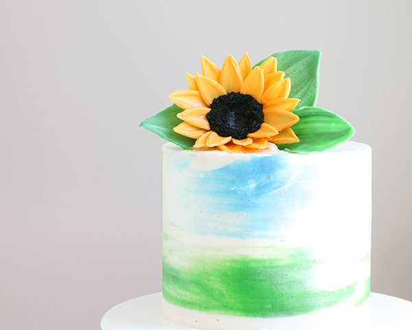 Sunflower Cake - how to make gorgeous sunflower cake decorations using melted chocolate | by Erin Gardner for TheCakeBlog.com