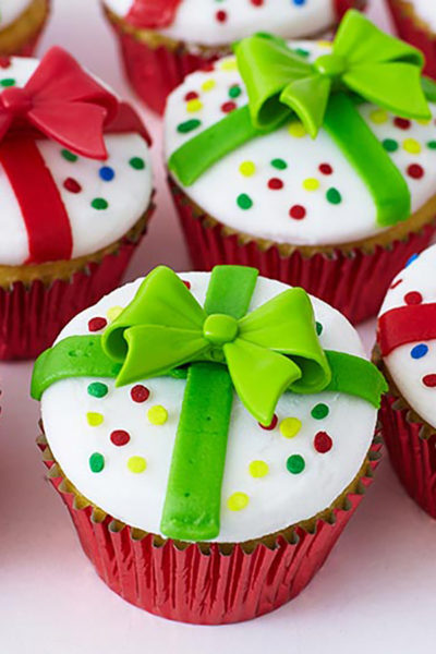 Present Cupcakes - how to decorate cupcakes to look like a Christmas present. A quick and easy holiday dessert | by Cakegirls for TheCakeBlog.com