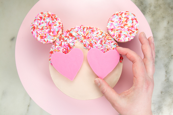 Sprinkle Girl Cake - how to make cute girly face cakes with sprinkles for the hair and chocolate heart sunglasses | by Erin Gardner for TheCakeBlog.com