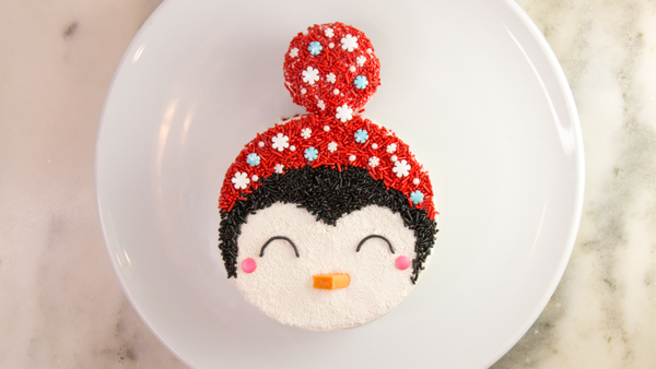 Penguin Cake - a sprinkle coated penguin cake too adorable for words | by Erin Gardner for TheCakeBlog.com